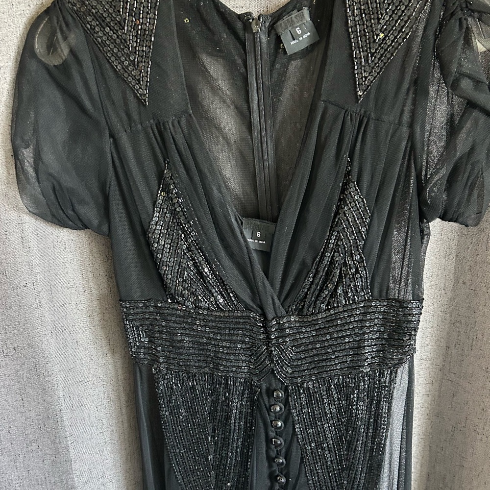 Vintage Anna Sui black embroidered size 6 gown worn once. Excellent condition